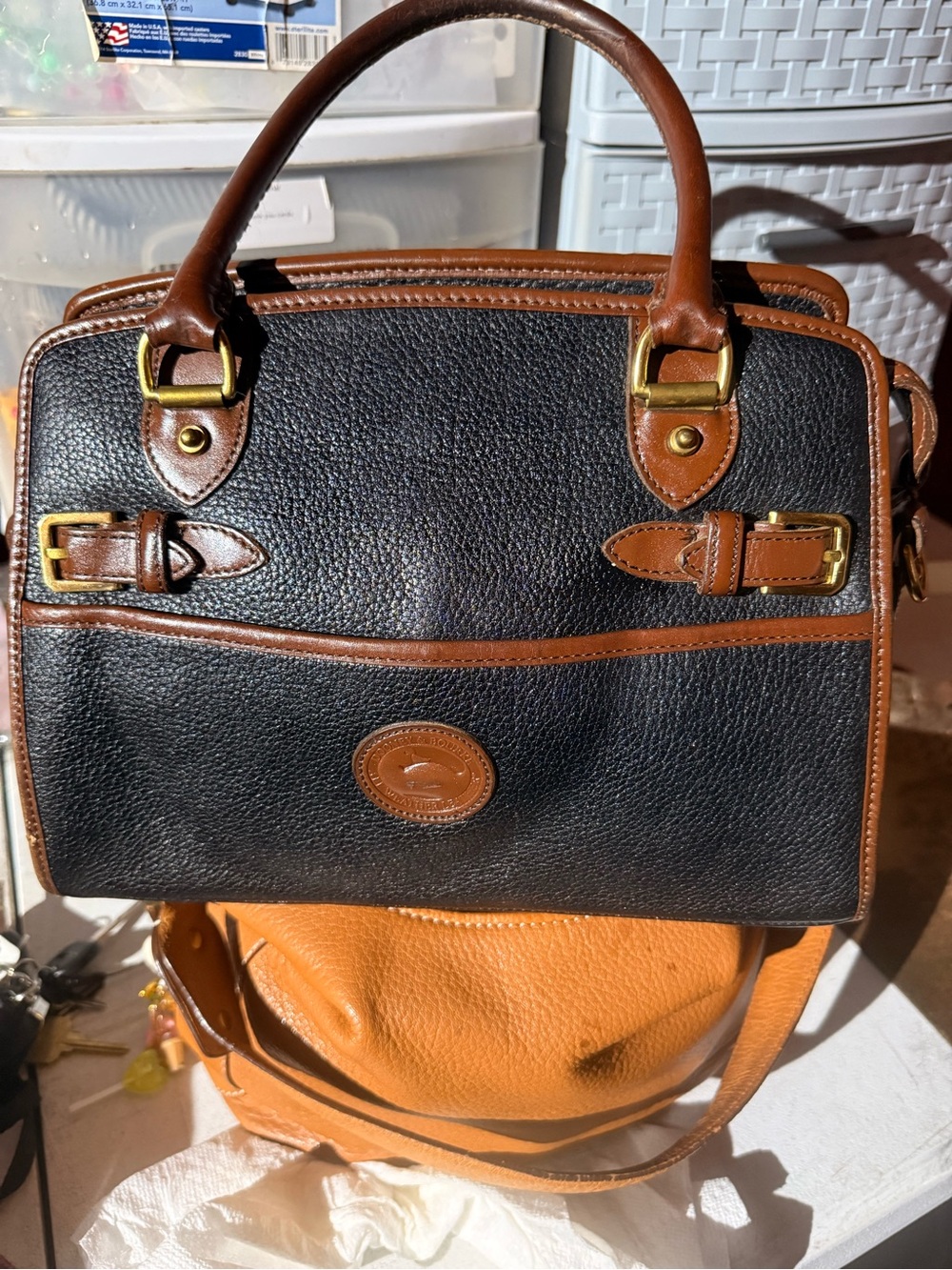 Dooney & Bourke Black with Brown Trim Pebbled Leather Satchel